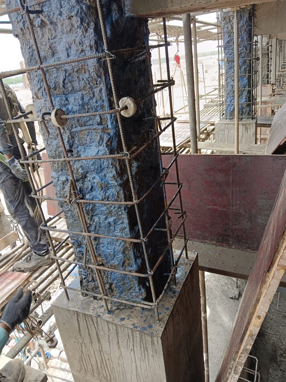 Column jacketing services for RCC strengthening to improve structural strength and load capacity in buildings